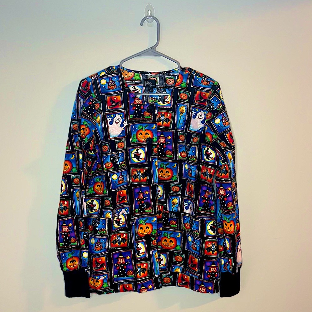Halloween scrub top/coat with multiple characters and sparkles
